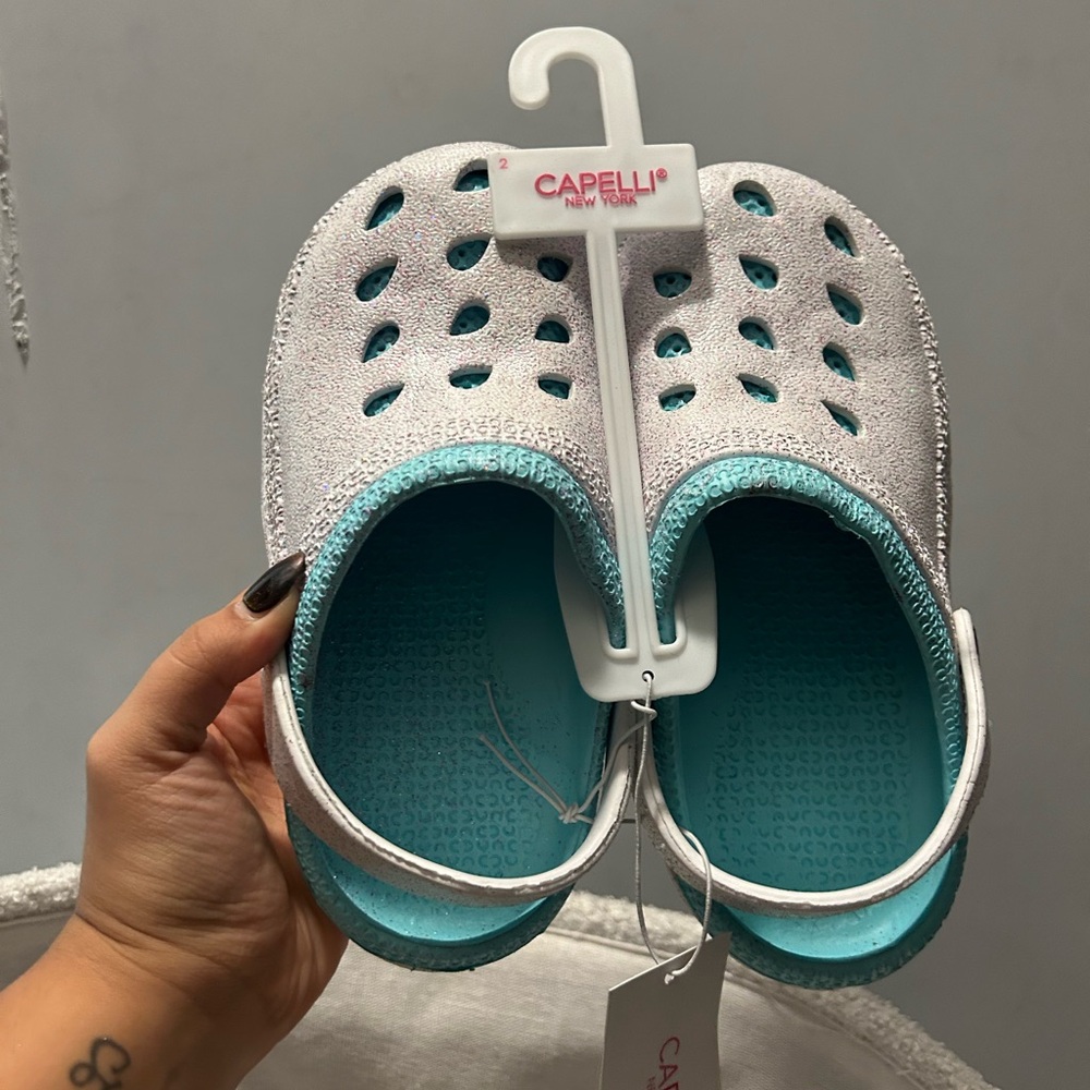 Girl’s glittery crocs